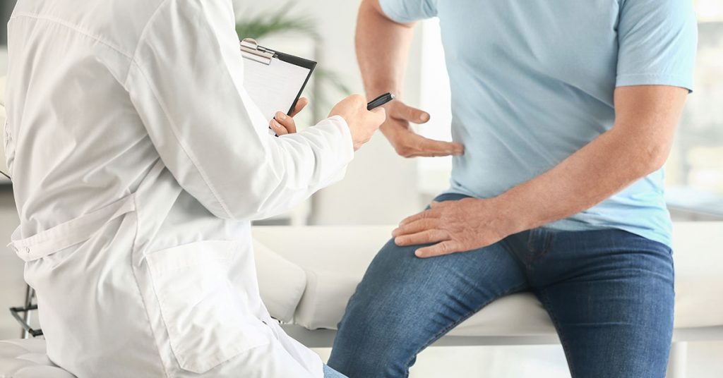 Male patient at urologist's office; blog: 10 Risk Factors for CKD