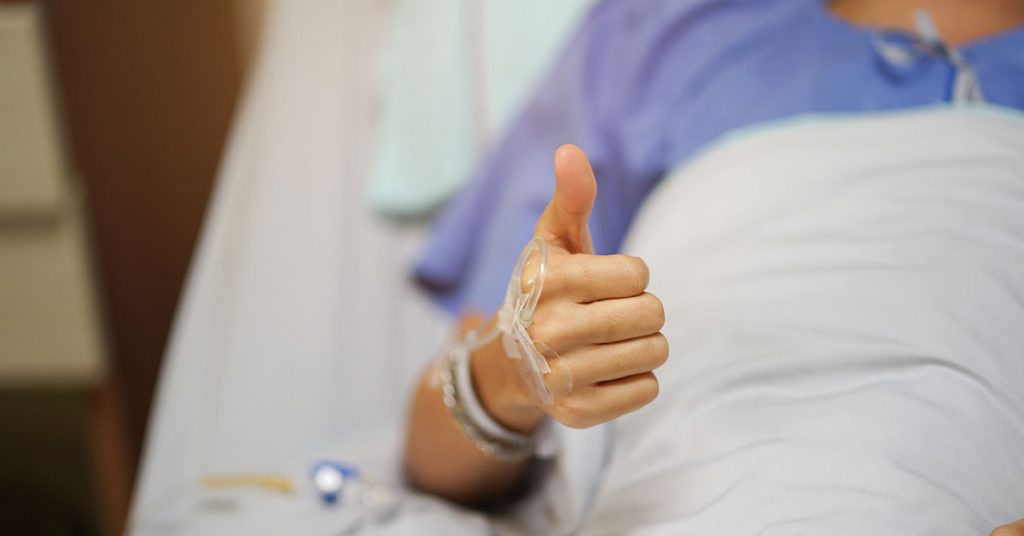 close up patient man hand show thumb up for good insurance or be; blog: 8 Tips for Kidney Transplant Recovery