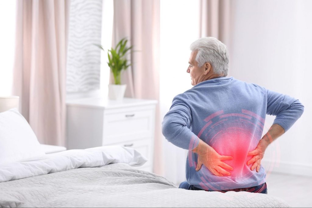 An elderly man experiencing Pain Associated with Kidney Disease