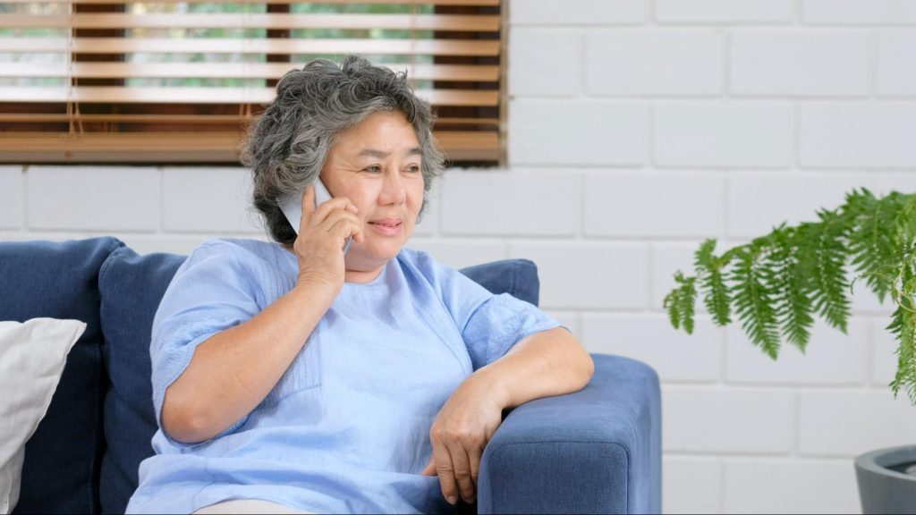 an elderly woman enrolled in chronic care management calling her clinician