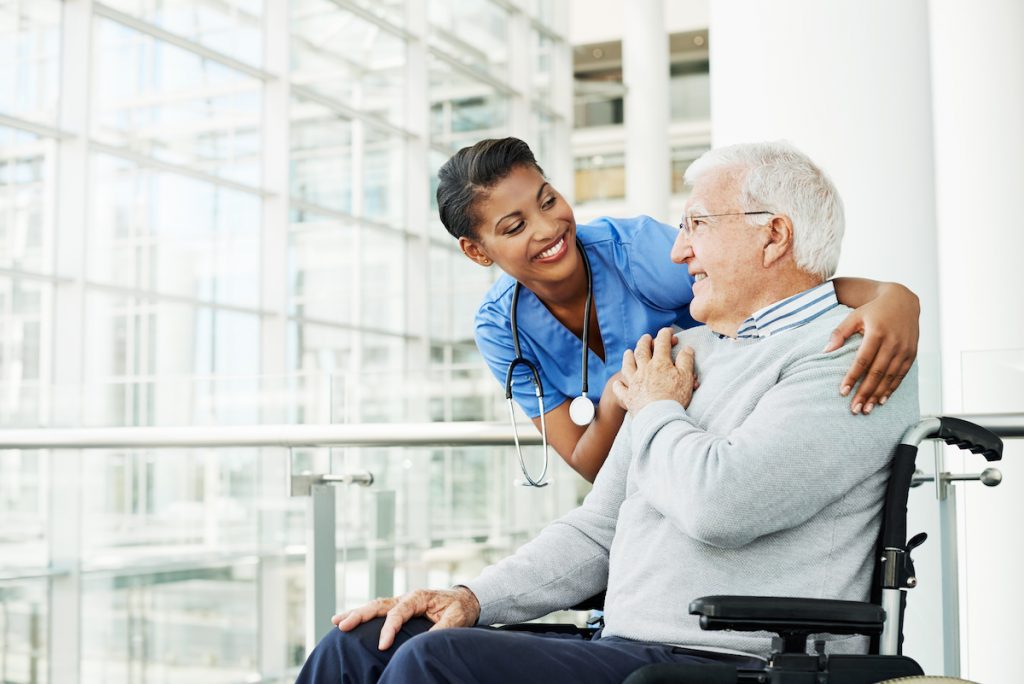 Shot of a young nurse caring for an elderly patient in a wheelchair to represent how to make ckd patients more comfortable